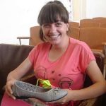 Children-receiving-their-new-dance-shoes.