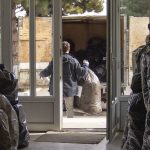 Paros Staffer, Peter Barsamian, helps load recyclables into the truck bound for Yerevan.
