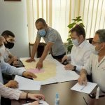 Reviewing plans to rebuild in Nerkin Karmir Aghbyur with Regional and local government representatives.